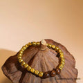 Pulsera de cuentas Bodhi oriental – Mantra de la luz dorada